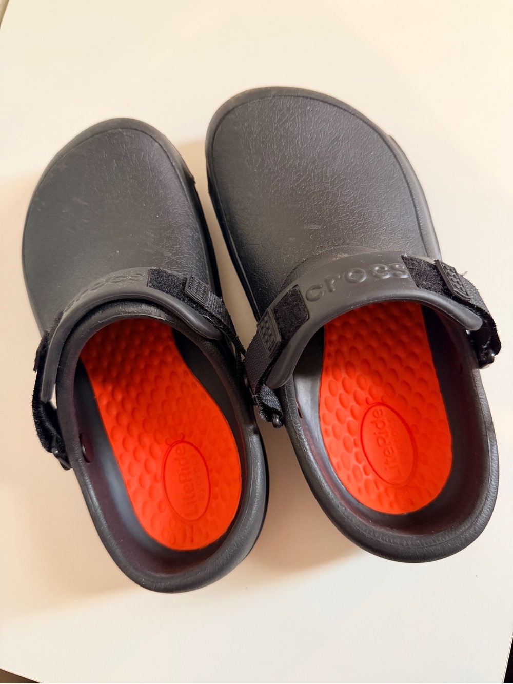 CROCS Black Clogs with Bright Orange Insoles